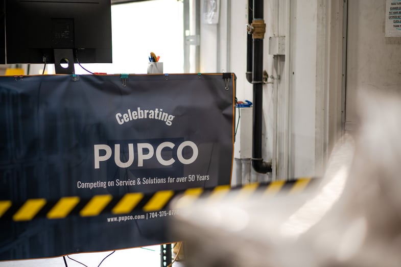 Image of old PUPCO branding. Celebrating PUPCO. Competing on service & solutions for over 50 years