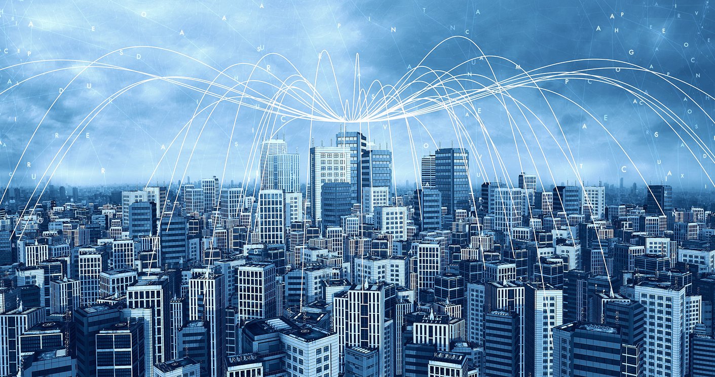Digital smart city skyline with skyscrapers connected by network lines, representing modern urban infrastructure and data connectivity.